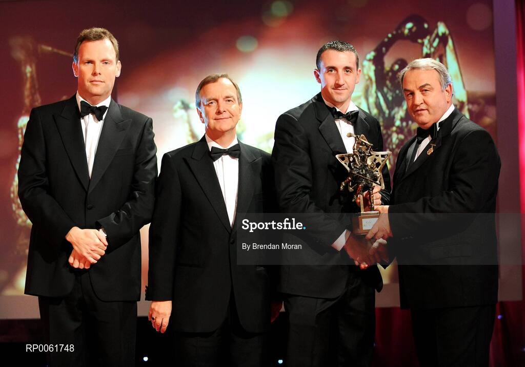 17 October 2008; Eoin Larkin of Kilkenny is presented with his GAA All-Star award by Nickey Brennan, GAA President, in the company of Minister for Arts, Sport and Tourism, Martin Cullen T.D., and Charles Butterworth, CEO Vodafone Ireland, left, during the 2008 GAA All-Stars sponsored by Vodafone. Citywest Hotel, Conference, Leisure & Golf Resort, Dublin. Picture credit: Brendan Moran / SPORTSFILE