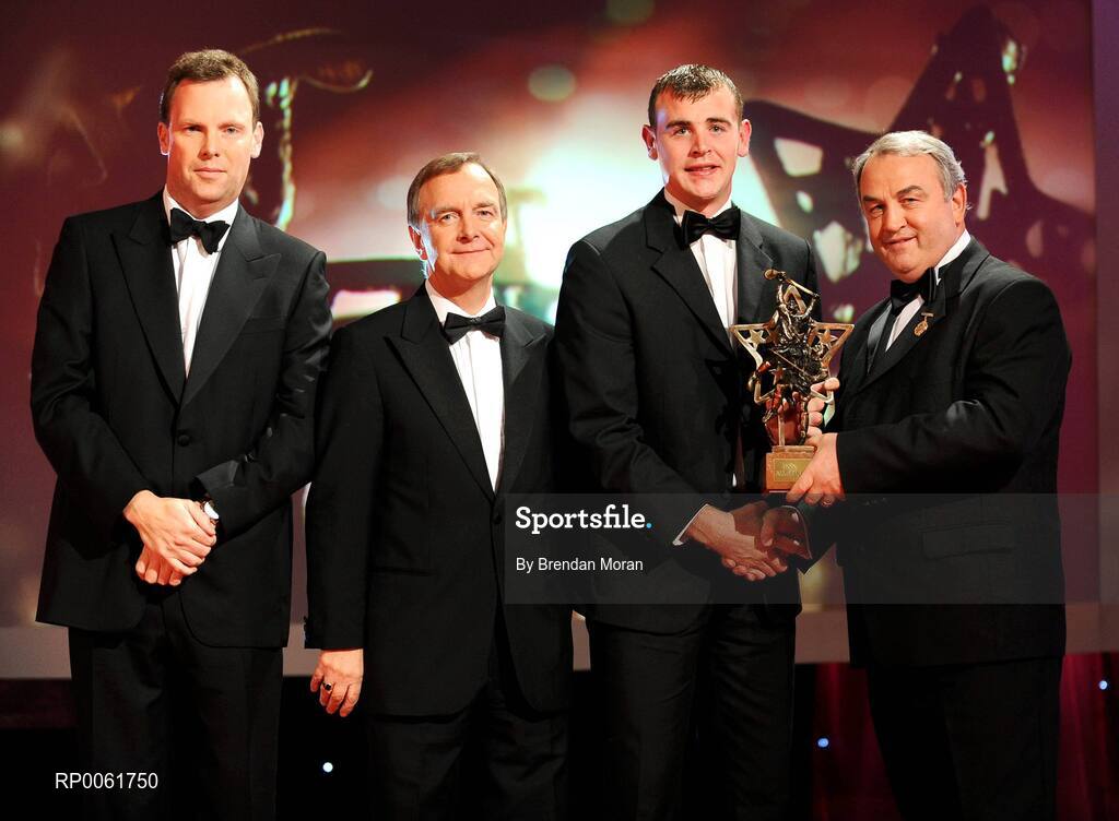 17 October 2008; Eoin Kelly of Waterford is presented with his GAA All-Star award by Nickey Brennan, GAA President, in the company of Minister for Arts, Sport and Tourism, Martin Cullen T.D., and Charles Butterworth, CEO Vodafone Ireland, left, during the 2008 GAA All-Stars sponsored by Vodafone. Citywest Hotel, Conference, Leisure & Golf Resort, Dublin. Picture credit: Brendan Moran / SPORTSFILE