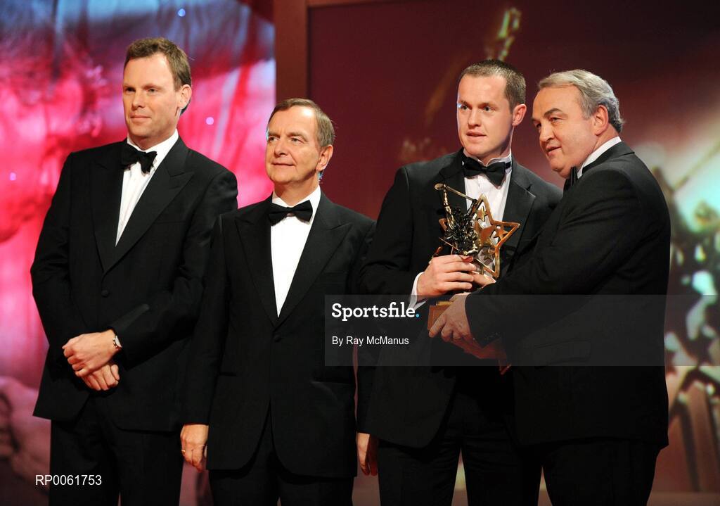 17 October 2008; Michael Kavanagh of Kilkenny is presented with his GAA All-Star award by Nickey Brennan, GAA President, in the company of Minister for Arts, Sport and Tourism, Martin Cullen T.D., and Charles Butterworth, CEO Vodafone Ireland, left, during the 2008 GAA All-Stars sponsored by Vodafone. Citywest Hotel, Conference, Leisure & Golf Resort, Dublin. Picture credit: Ray McManus / SPORTSFILE