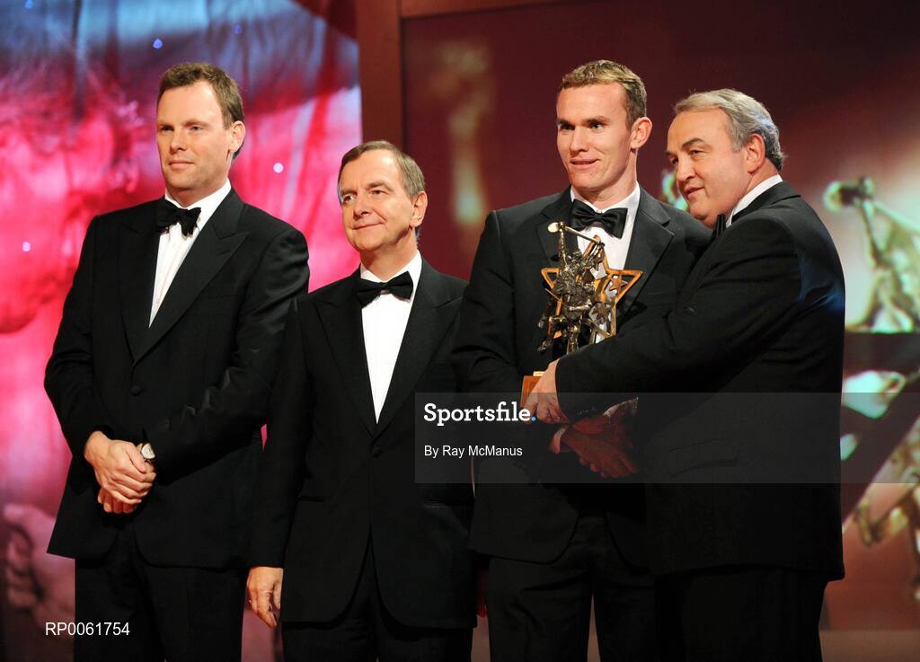 17 October 2008; Noel Hickey of Kilkenny is presented with his GAA All-Star award by Nickey Brennan, GAA President, in the company of Minister for Arts, Sport and Tourism, Martin Cullen T.D., and Charles Butterworth, CEO Vodafone Ireland, left, during the 2008 GAA All-Stars sponsored by Vodafone. Citywest Hotel, Conference, Leisure & Golf Resort, Dublin. Picture credit: Ray McManus / SPORTSFILE