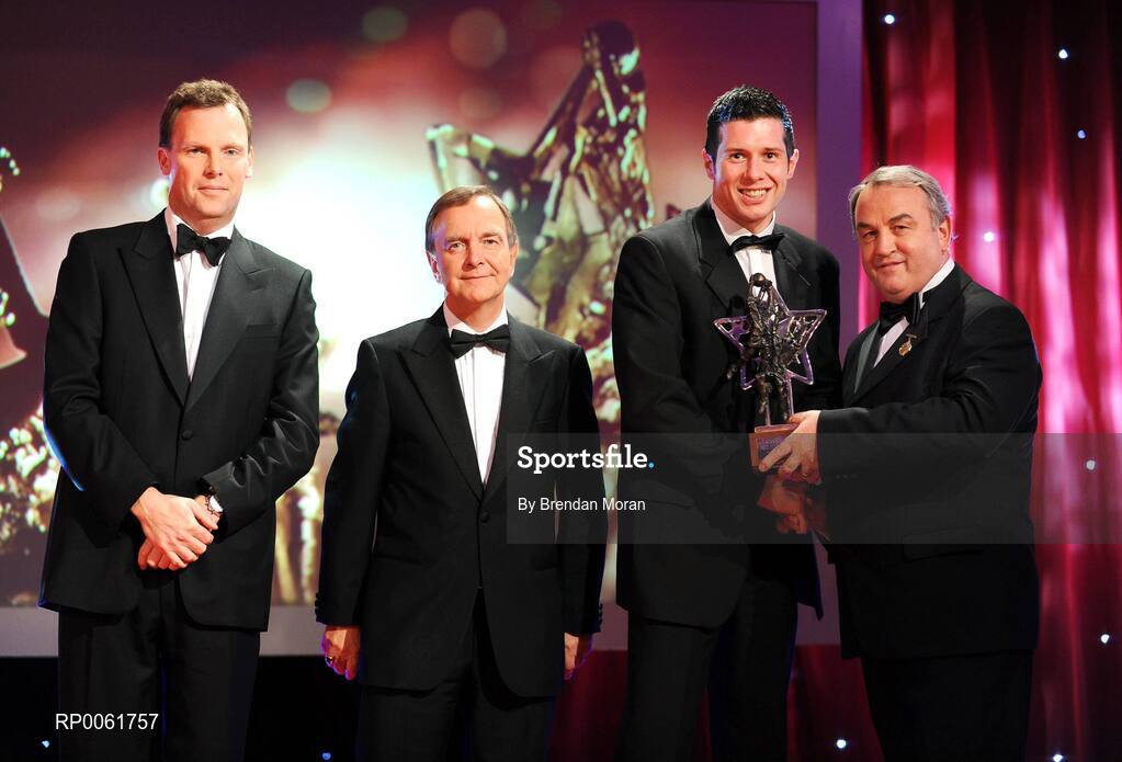 17 October 2008; Sean Cavanagh of Tyrone is presented with his GAA All-Star Footballer of the Year award by Nickey Brennan, GAA President, in the company of Minister for Arts, Sport and Tourism, Martin Cullen T.D., and Charles Butterworth, CEO Vodafone Ireland, left, during the 2008 GAA All-Stars sponsored by Vodafone. Citywest Hotel, Conference, Leisure & Golf Resort, Dublin. Picture credit: Brendan Moran / SPORTSFILE