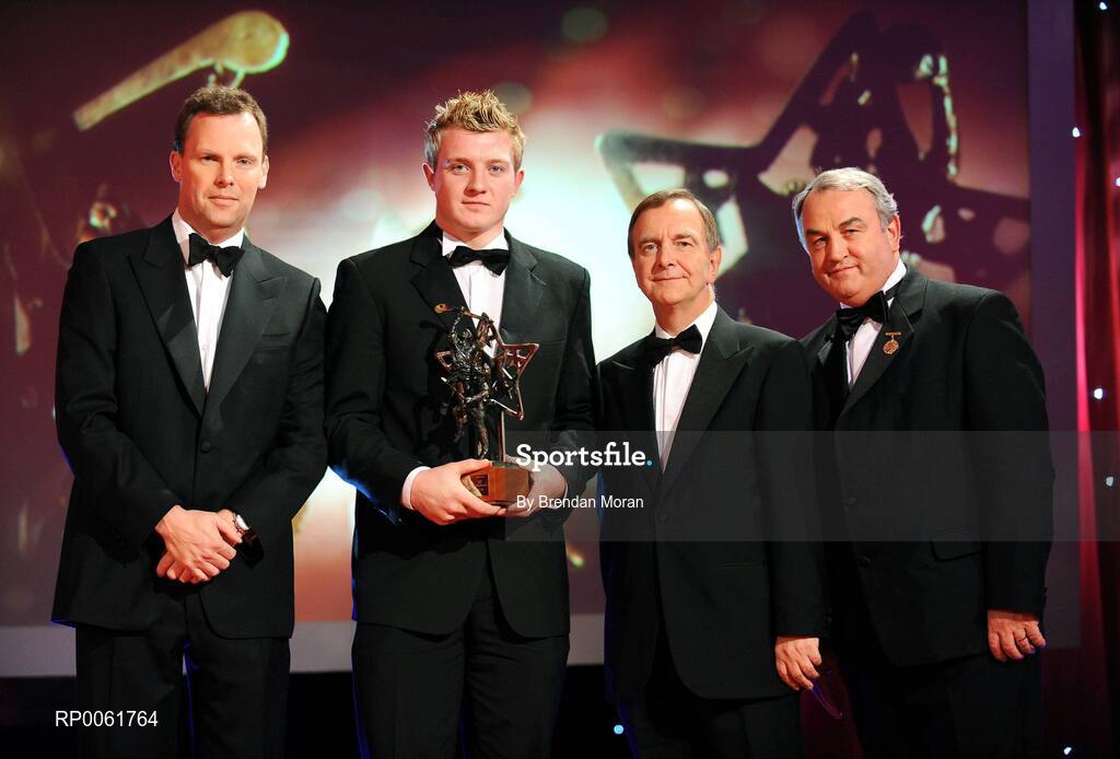 17 October 2008; Joe Canning of Galway with his GAA All-Star Young Hurler of the Year award in the company of Charles Butterworth, CEO Vodafone Ireland, left, Minister for Arts, Sport and Tourism, Martin Cullen T.D., and Nickey Brennan, GAA President, right, during the 2008 GAA All-Stars sponsored by Vodafone. Citywest Hotel, Conference, Leisure & Golf Resort, Dublin. Picture credit: Brendan Moran / SPORTSFILE