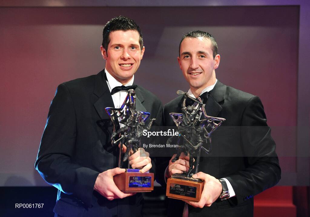 17 October 2008; Vodafone GAA All-Star players of the year, Tyrone Footballer Sean Cavanagh, left, and Kilkenny hurler Eoin Larkin during the GAA All-Stars Awards 2008 Sponsored by Vodafone. Citywest Hotel, Conference, Leisure & Golf Resort, Dublin. Picture credit: Brendan Moran / SPORTSFILE