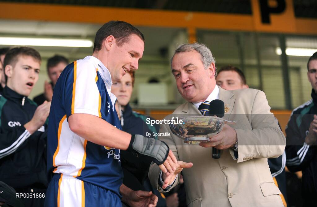 18 October 2008; President of the GAA Nickey Brennan presents the cup to Scotland captain Kenny Ross. Senior Men's Shinty International, Ireland v Scotland, Nowlan Park, Kilkenny. Photo by Sportsfile