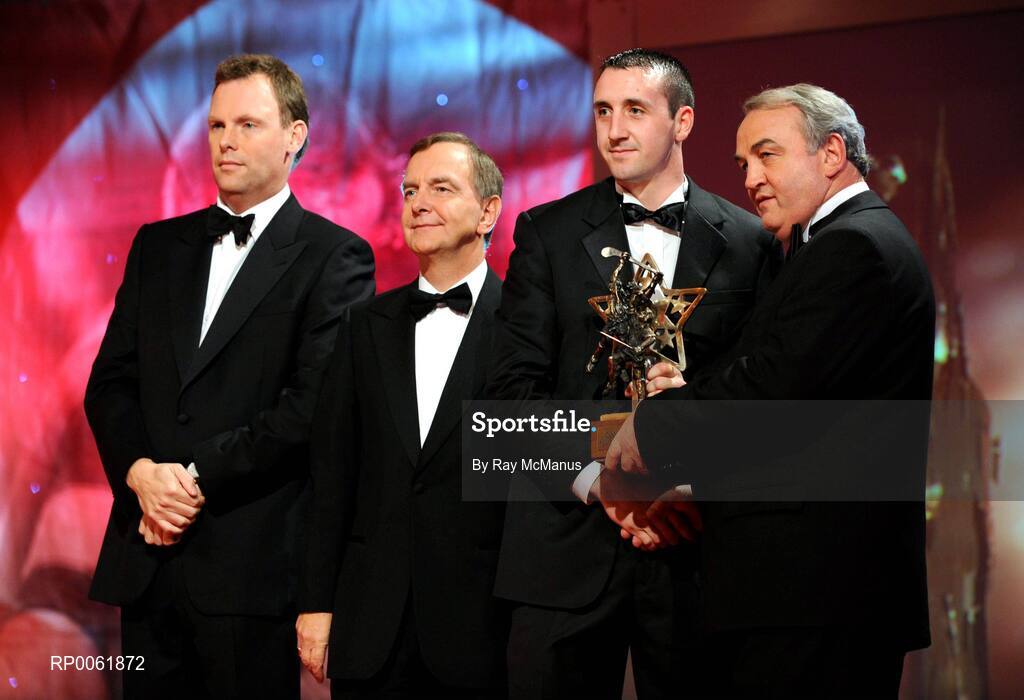 17 October 2008; Eoin Larkin of Kilkenny is presented with his GAA All-Star award by Nickey Brennan, GAA President, in the company of Minister for Arts, Sport and Tourism, Martin Cullen T.D., and Charles Butterworth, CEO Vodafone Ireland, left, during the 2008 GAA All-Stars sponsored by Vodafone. Citywest Hotel, Conference, Leisure & Golf Resort, Dublin. Picture credit: Ray McManus / SPORTSFILE