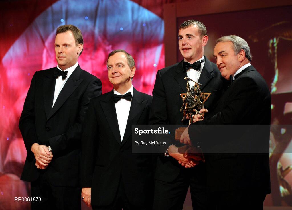 17 October 2008; Eoin Kelly of Waterford is presented with his GAA All-Star award by Nickey Brennan, GAA President, in the company of Minister for Arts, Sport and Tourism, Martin Cullen T.D., and Charles Butterworth, CEO Vodafone Ireland, left, during the 2008 GAA All-Stars sponsored by Vodafone. Citywest Hotel, Conference, Leisure & Golf Resort, Dublin. Picture credit: Ray McManus / SPORTSFILE