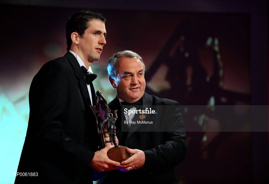 17 October 2008; Justin McMahon of Tyrone is presented with his GAA All-Star award by Nickey Brennan, GAA President, during the 2008 GAA All-Stars sponsored by Vodafone. Citywest Hotel, Conference, Leisure & Golf Resort, Dublin. Picture credit: Ray McManus / SPORTSFILE