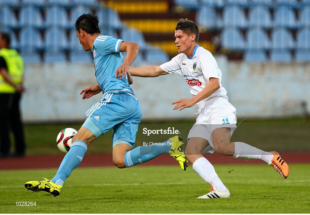 16 July 2015; Nicolas Gorosito, Slovan Bratislava, in action against Ryan Swan, UCD. UEFA Europa League, 2nd Qualifying Round, 1st Leg, Slovan Bratislava v UCD. Štadión Pasienky, Bratislava, Slovakia. Picture credit: Christian Ort / SPORTSFILE