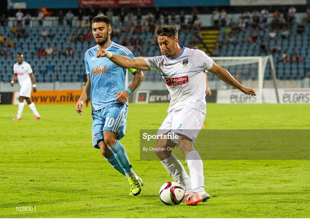 16 July 2015; Mark Langtry, UCD, in action against Marko Milinkovic, Slovan Bratislava. UEFA Europa League, 2nd Qualifying Round, 1st Leg, Slovan Bratislava v UCD. Štadión Pasienky, Bratislava, Slovakia. Picture credit: Christian Ort / SPORTSFILE