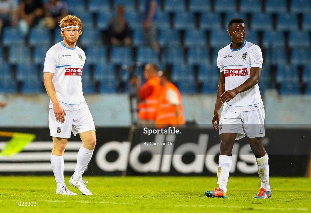 16 July 2015; Conor Cannon and Maxim Kouogun, UCD, after the fnal whistle. UEFA Europa League, 2nd Qualifying Round, 1st Leg, Slovan Bratislava v UCD. Štadión Pasienky, Bratislava, Slovakia. Picture credit: Christian Ort / SPORTSFILE