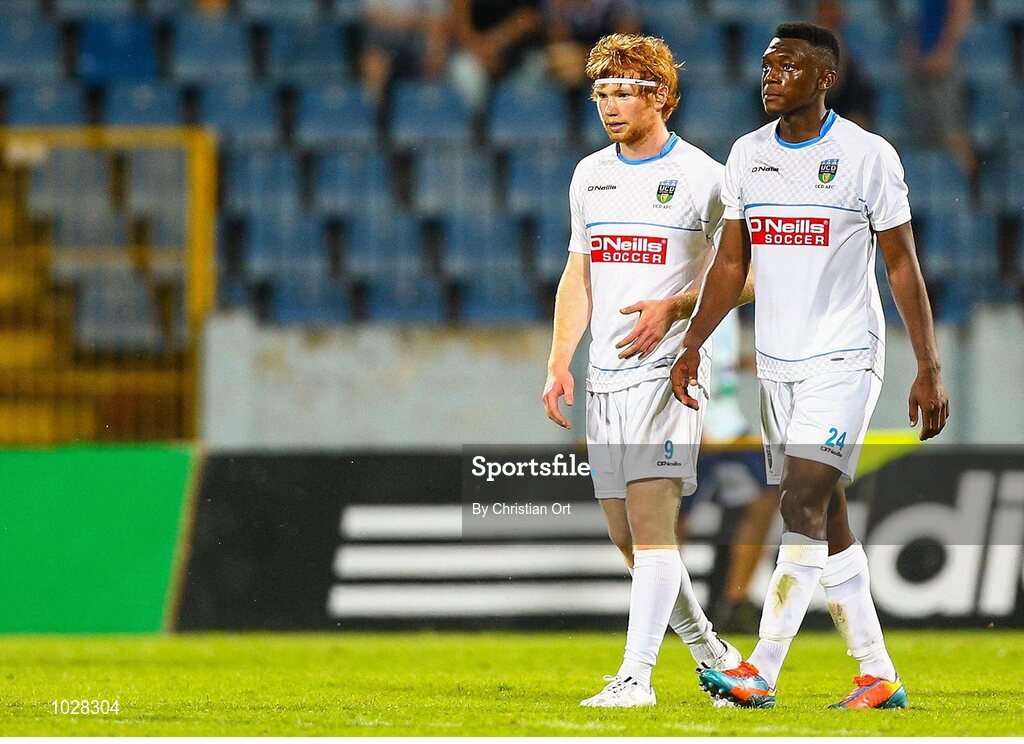 16 July 2015; Conor Cannon and Maxim Kouogun, UCD, after the fnal whistle. UEFA Europa League, 2nd Qualifying Round, 1st Leg, Slovan Bratislava v UCD. Štadión Pasienky, Bratislava, Slovakia. Picture credit: Christian Ort / SPORTSFILE