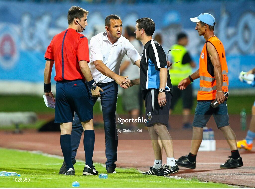 16 July 2015; UCD head coach Colin O'Neill shakes hands with Slovan Bratislava head coach Jan Svehlik after the game. UEFA Europa League, 2nd Qualifying Round, 1st Leg, Slovan Bratislava v UCD. Štadión Pasienky, Bratislava, Slovakia. Picture credit: Christian Ort / SPORTSFILE