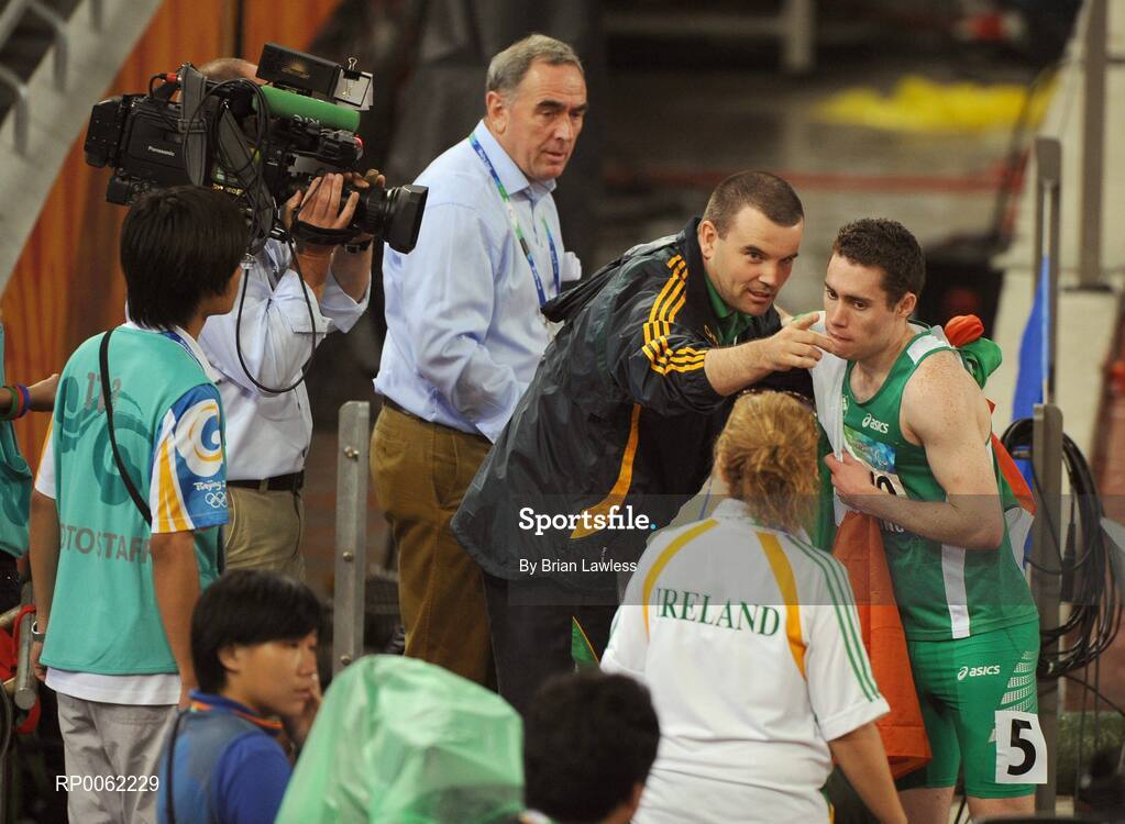 16 September 2008; Ireland's Jason Smyth, from Eglinton, Co. Derry, with Liam Harbison after winning the Men's 200m -T13 Final. Smyth won his second gold of these Paralympic games in a World record time of 21.43 seconds, his first coming in the Men's 100m T13 Final also in a world record time of 10.62. Beijing Paralympic Games 2008, Men's 200m -T13, Final, National Stadium, Olympic Green, Beijing, China. Picture credit: Brian Lawless / SPORTSFILE