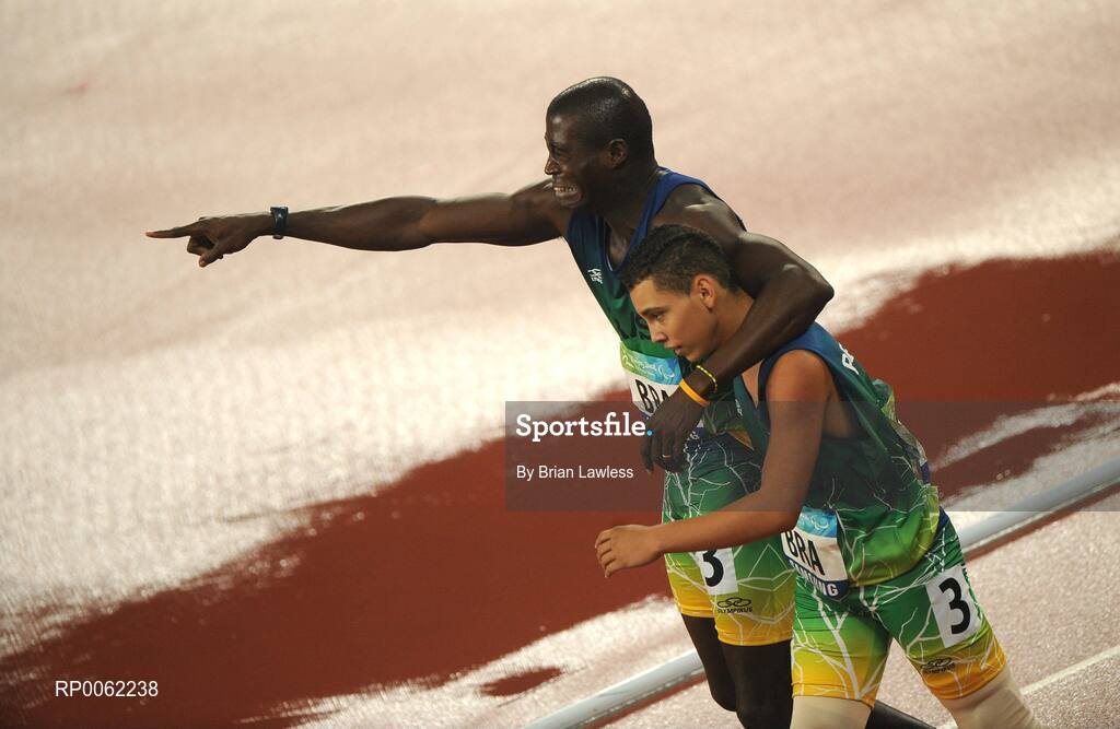 16 September 2008; Brazilian athletes Alan Oliveira, right, and Andre Luiz Oliveira, celebrate after finishing 2nd in the Men's 4 X 100m Relay - T42-T46 Final. Beijing Paralympic Games 2008, 4 X 100m Relay - T42-T46 Final, National Stadium, Olympic Green, Beijing, China. Picture credit: Brian Lawless / SPORTSFILE