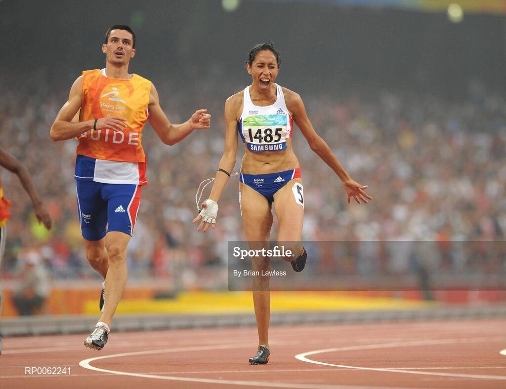 16 September 2008; Visually impaired Assia El'Hannouni of France celebrates after winning the Women's 200m -T12 final in a world record time of 24.84. Beijing Paralympic Games 2008, Women's 200m -T12 Final, National Stadium, Olympic Green, Beijing, China. Picture credit: Brian Lawless / SPORTSFILE