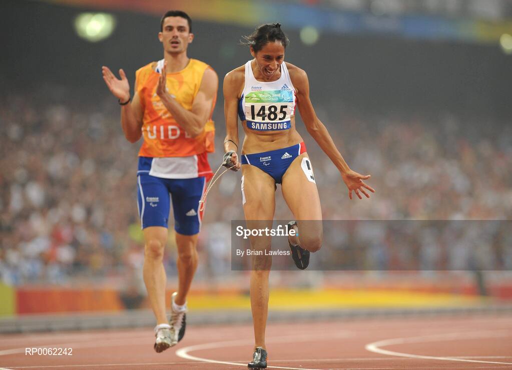 16 September 2008; Visually impaired Assia El'Hannouni of France celebrates after winning the Women's 200m -T12 final in a world record time of 24.84. Beijing Paralympic Games 2008, Women's 200m -T12 Final, National Stadium, Olympic Green, Beijing, China. Picture credit: Brian Lawless / SPORTSFILE