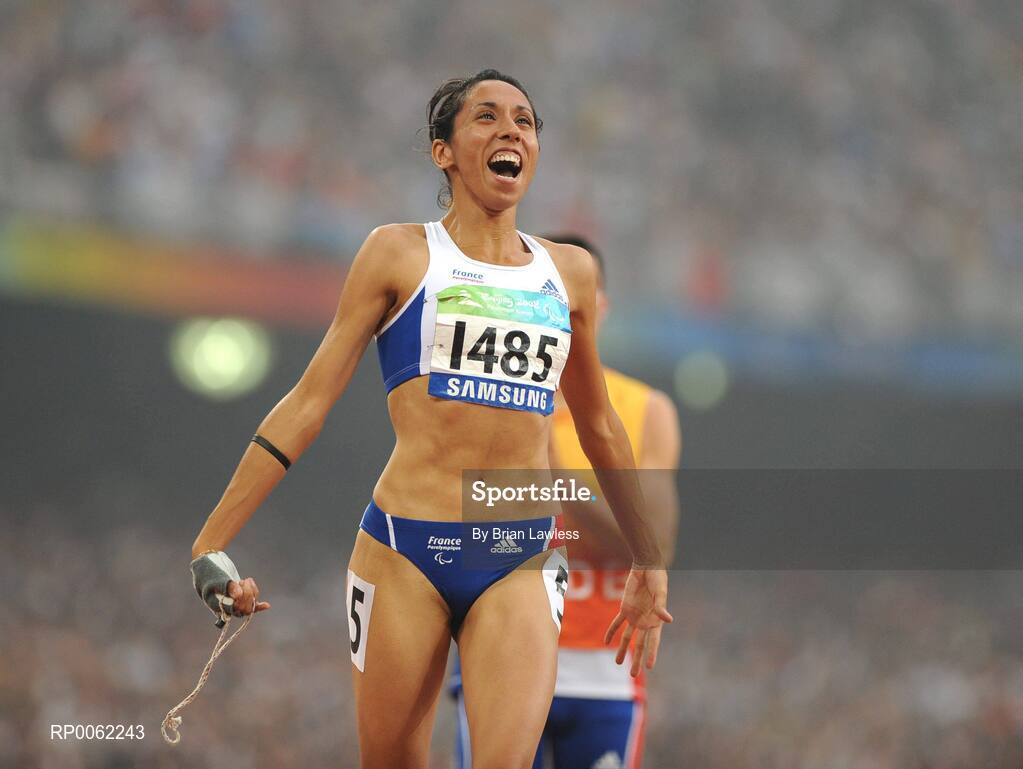 16 September 2008; Visually impaired Assia El'Hannouni of France celebrates after winning the Women's 200m -T12 final in a world record time of 24.84. Beijing Paralympic Games 2008, Women's 200m -T12 Final, National Stadium, Olympic Green, Beijing, China. Picture credit: Brian Lawless / SPORTSFILE