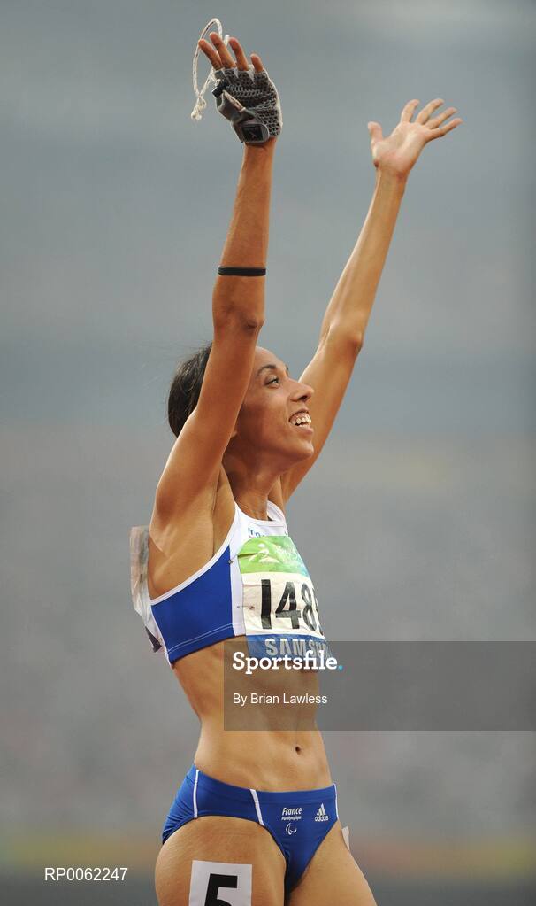 16 September 2008; Visually impaired Assia El'Hannouni of France celebrates after winning the Women's 200m -T12 final in a world record time of 24.84. Beijing Paralympic Games 2008, Women's 200m -T12 Final, National Stadium, Olympic Green, Beijing, China. Picture credit: Brian Lawless / SPORTSFILE