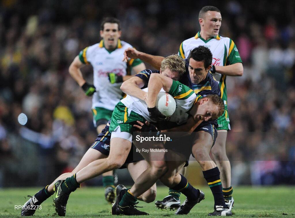 24 October 2008; Benny Coulter, Ireland, is tackled by Australian players Adam Selwood, left, and Michael Firrito. 2008 Toyota International Rules Series, Australia v Ireland, Subiaco Oval, Perth, Western Australia. Picture credit: Ray McManus / SPORTSFILE