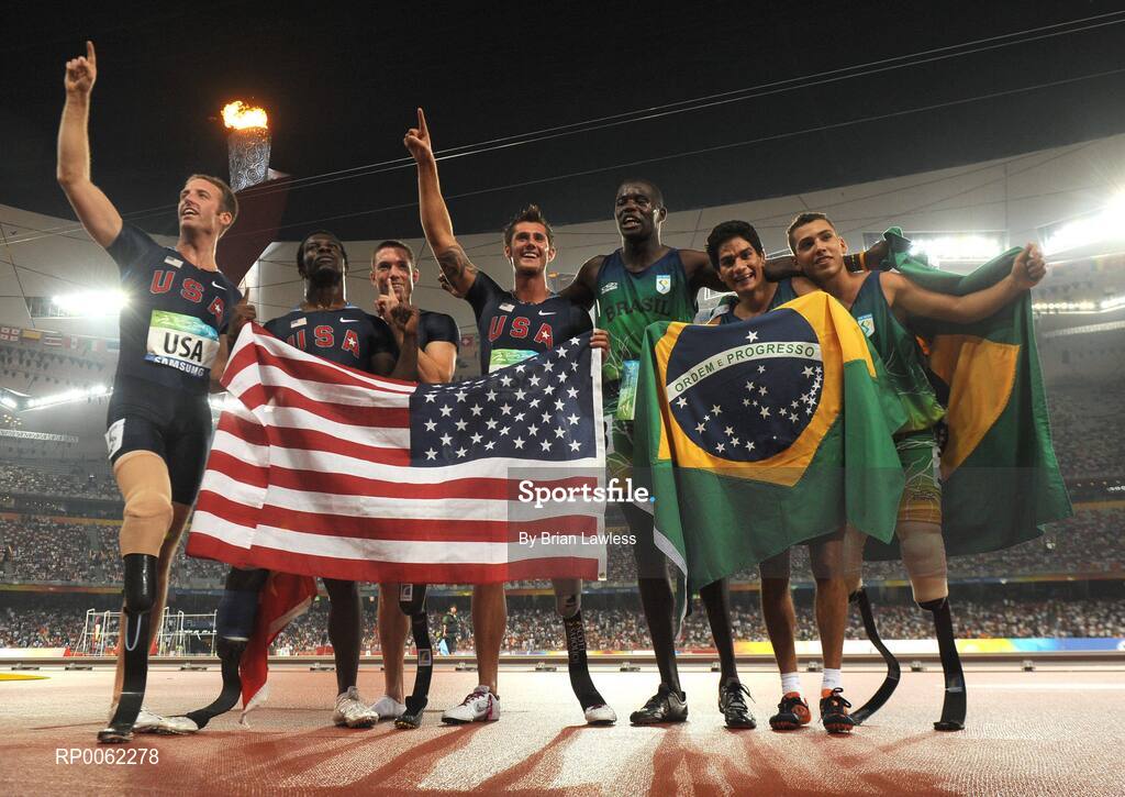 16 September 2008; USA and Brazil athletes celebrate after finishing 1st and 2nd respectively in the Men's 4 X 100m Relay - T42-T46 Final. USA won in a world record time of 42.75. Beijing Paralympic Games 2008, 4 X 100m Relay - T42-T46 Final, National Stadium, Olympic Green, Beijing, China. Picture credit: Brian Lawless / SPORTSFILE