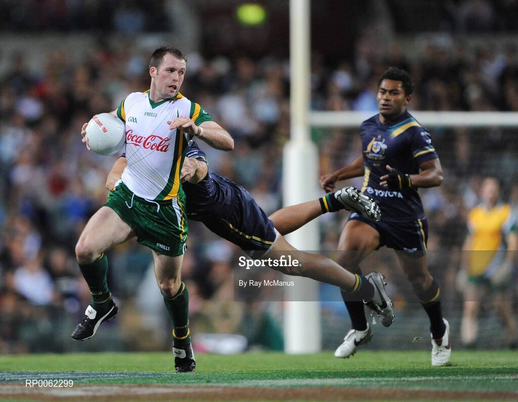 24 October 2008; Ciaran McKeever, Ireland, escapes a tackle from Australia's Jared Brennan. 2008 Toyota International Rules Series, Australia v Ireland, Subiaco Oval, Perth, Western Australia. Picture credit: Ray McManus / SPORTSFILE