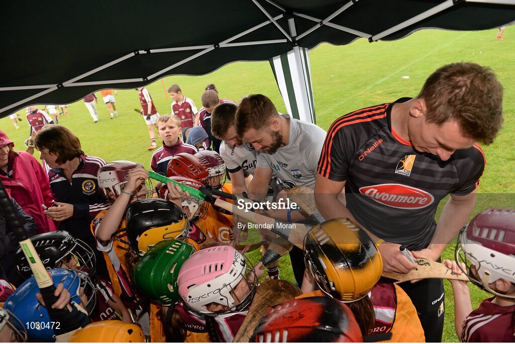 14 July 2015; Young players from Dicksboro GAA Club get autographs from Noel Connors, Waterford, and Cillian Buckley, Kilkenny, at the launch of the GAA Hurling All-Ireland Senior Championship Series 2015. Dicksboro GAA club, Kilkenny. Picture credit: Brendan Moran / SPORTSFILE