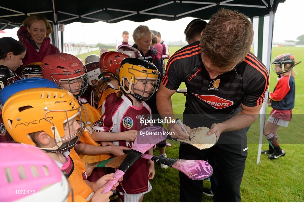 14 July 2015; Young players from Dicksboro GAA Club get autographs from Cillian Buckley, Kilkenny, at the launch of the GAA Hurling All-Ireland Senior Championship Series 2015. Dicksboro GAA club, Kilkenny. Picture credit: Brendan Moran / SPORTSFILE