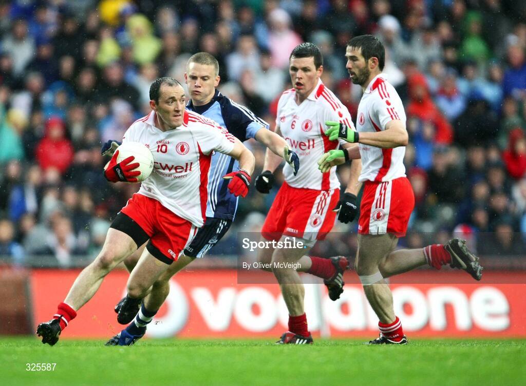 16 August 2008; Brian Dooher, Tyrone, in action against Tomas Quinn, Dublin. GAA Football All-Ireland Senior C'ship Quarter-Final, Dublin v Tyrone, Croke Park, Dublin. Picture credit: Oliver McVeigh / SPORTSFILE