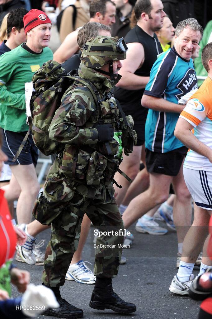 27 October 2008; A competitor dressed as a soldier in action during the Lifestyle Sports - adidas Dublin Marathon 2008. Merrion Square, Dublin. Picture credit: Brendan Moran / SPORTSFILE
