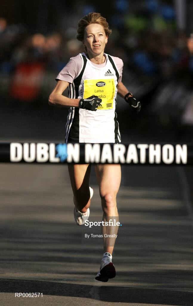 27 October 2008; Larissa Zousko, of Russia, crosses the finish line to win the Lifestyle Sports - adidas Dublin Marathon 2008. Merrion Square, Dublin. Picture credit: Tomas Greally / SPORTSFILE