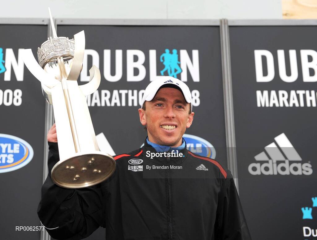 27 October 2008; Men's winner Andriy Naumov of the Ukraine with the Noel Carroll Perpetual trophy after the Lifestyle Sports - adidas Dublin Marathon 2008. Merrion Square, Dublin. Picture credit: Brendan Moran / SPORTSFILE