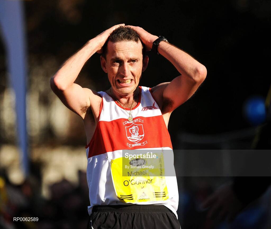 27 October 2008; Michael O'Connor of Galway City Harriers AC, reacts after coming home as the first Irishman and National Marathon Champion 2008, during the Lifestyle Sports - adidas Dublin Marathon 2008. Merrion Square, Dublin. Picture credit: Tomas Greally / SPORTSFILE