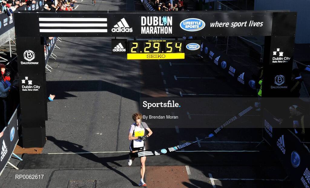 27 October 2008; Larissa Zousko, of Russia, crosses the finish line to win the Lifestyle Sports - adidas Dublin Marathon 2008. Merrion Square, Dublin. Picture credit: Brendan Moran / SPORTSFILE