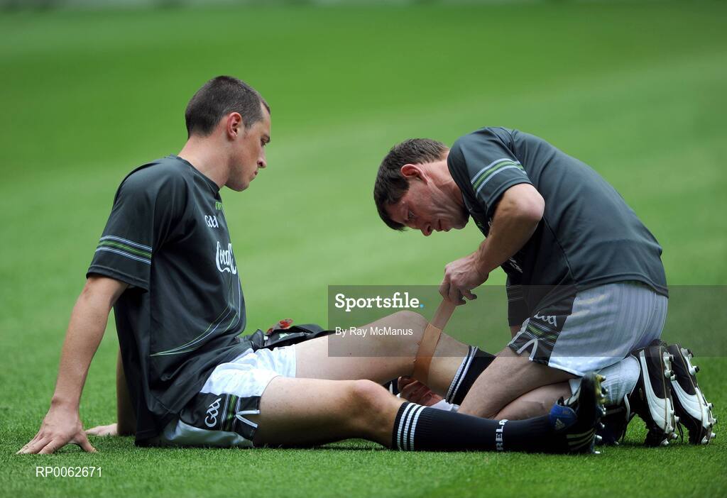 28 October 2008; Irish physio Frank Foley straps up Kieran Donaghy's knee during an Ireland International Rules training session. 2008 International Rules tour, Melbourne Cricket Ground, Melbourne, Auatralia. Picture credit: Ray McManus / SPORTSFILE