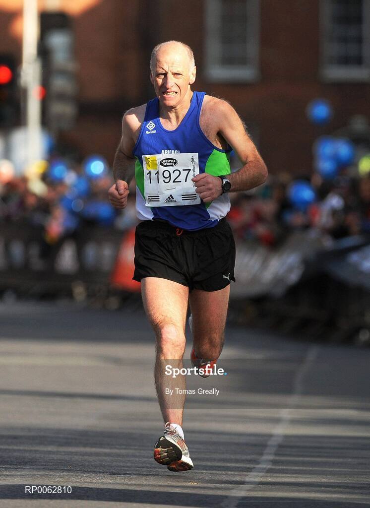 27 October 2008; Dermot Kerr comes home to win the Men's over 50 section and finish in an overall place of 29th during the Lifestyle Sports - adidas Dublin Marathon 2008. Merrion Square, Dublin. Picture credit: Tomas Greally / SPORTSFILE