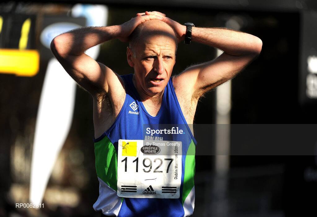 27 October 2008; Dermot Kerr reacts after crossing the line to win the Men's over 50 section and finish in an overall place of 29th during the Lifestyle Sports - adidas Dublin Marathon 2008. Merrion Square, Dublin. Picture credit: Tomas Greally / SPORTSFILE