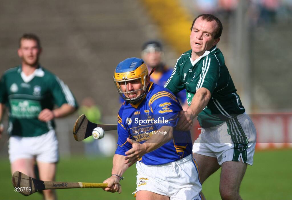 12 October 2008; Francis Fullerton, Keady Lamh Dhearg, in action against Liam Clarke, Ballygalget John Mitchels. AIB Ulster Club Senior Hurling Championship Semi-Final, Ballygalget John Mitchels v Keady Lamh Dhearg, Casement Park, Belfast, Co. Antrim. Picture credit: Oliver McVeigh / SPORTSFILE