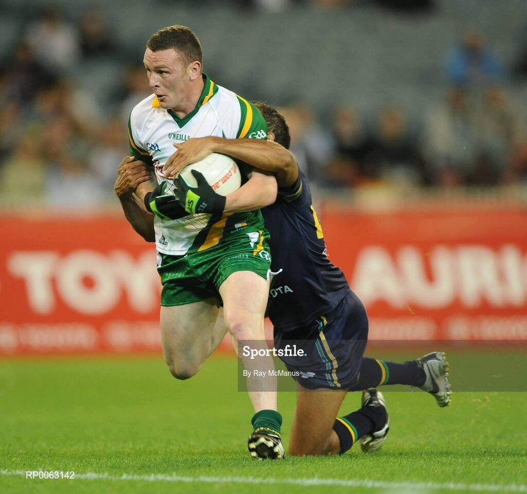 31 October 2008; Leighton Glynn, Ireland, is tackled by Roger Hayden, Australia. Toyota International Rules Series, Australia v Ireland, Melbourne Cricket Ground, Melbourne, Australia. Picture credit: Ray McManus / SPORTSFILE
