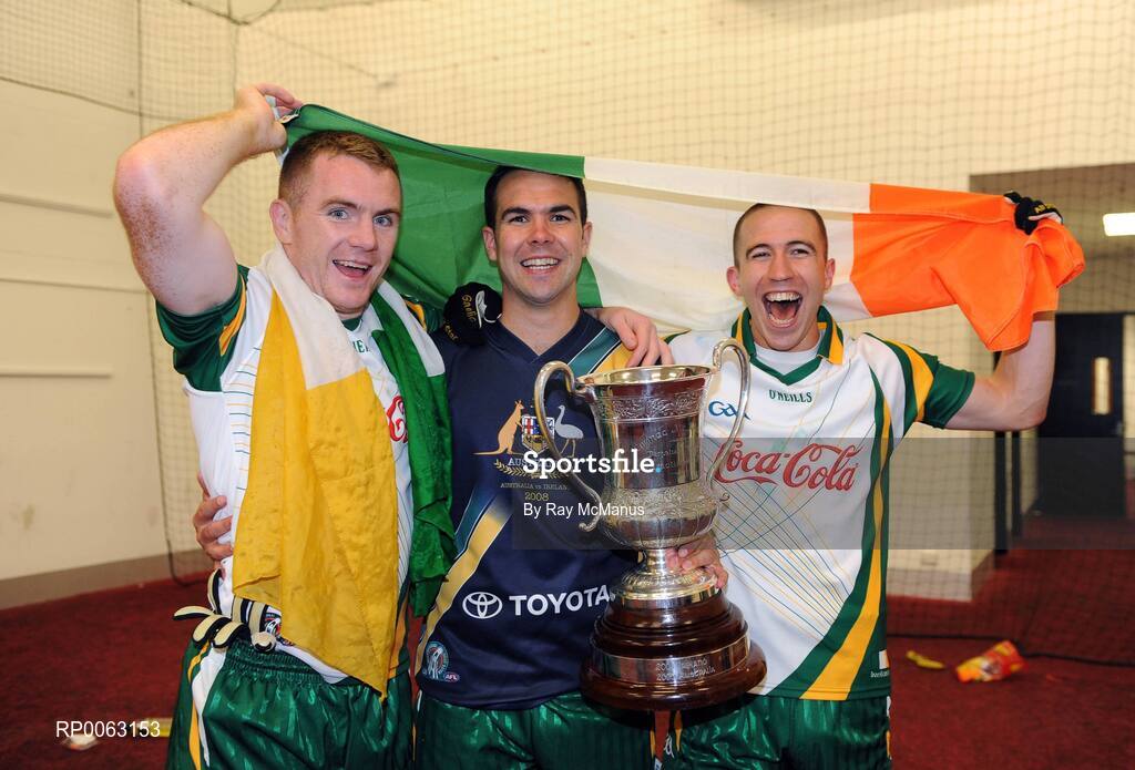 31 October 2008; Ireland players Marty McGrath, Fermanagh, Paul Finlay, Monaghan, and John Keane, Westmeath, celebrate with the Cormac McAnallen Cup in the dressing room area after the game. Toyota International Rules Series, Australia v Ireland, Melbourne Cricket Ground, Melbourne, Australia. Picture credit: Ray McManus / SPORTSFILE
