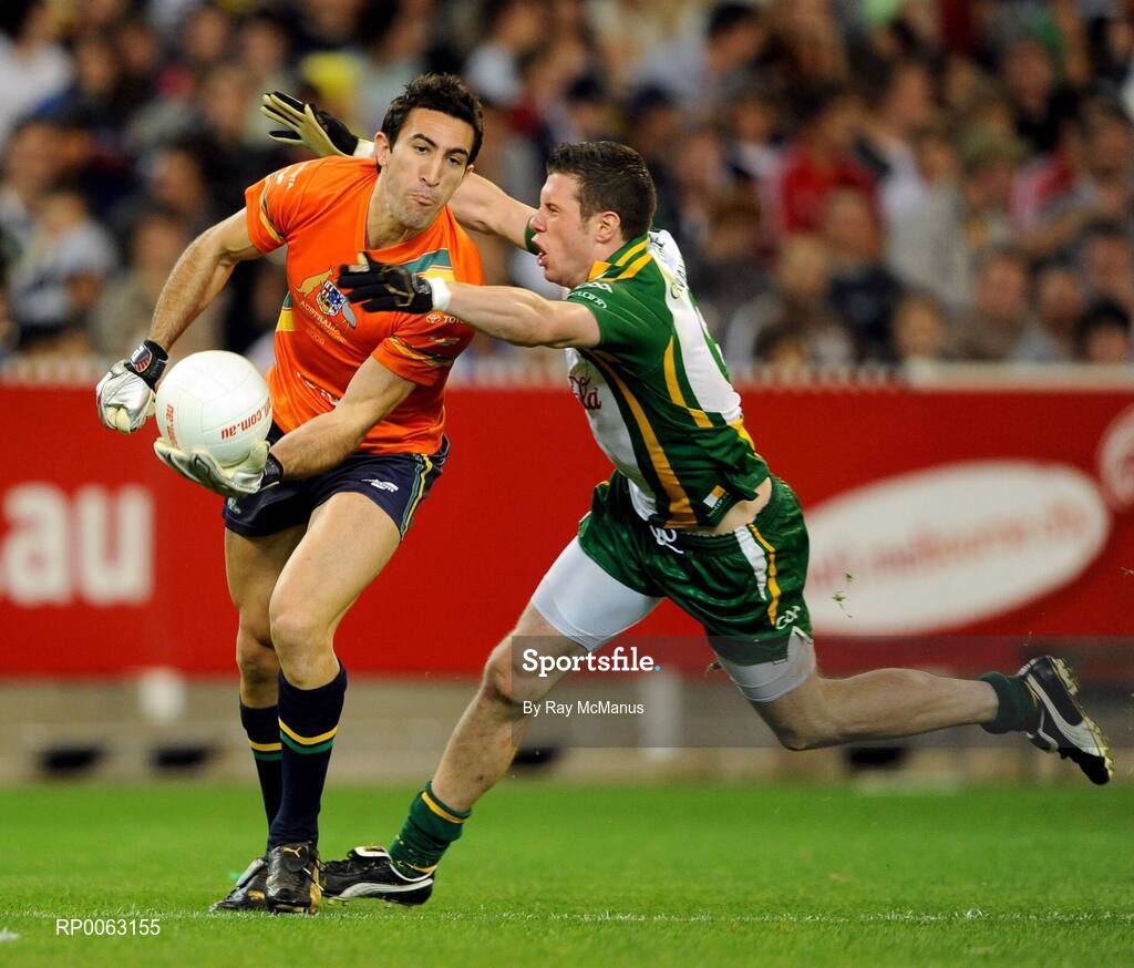 31 October 2008; Australia goalkeeper Michael Firrito is tackled by Ireland captain Sean Cavanagh. Toyota International Rules Series, Australia v Ireland, Melbourne Cricket Ground, Melbourne, Australia. Picture credit: Ray McManus / SPORTSFILE