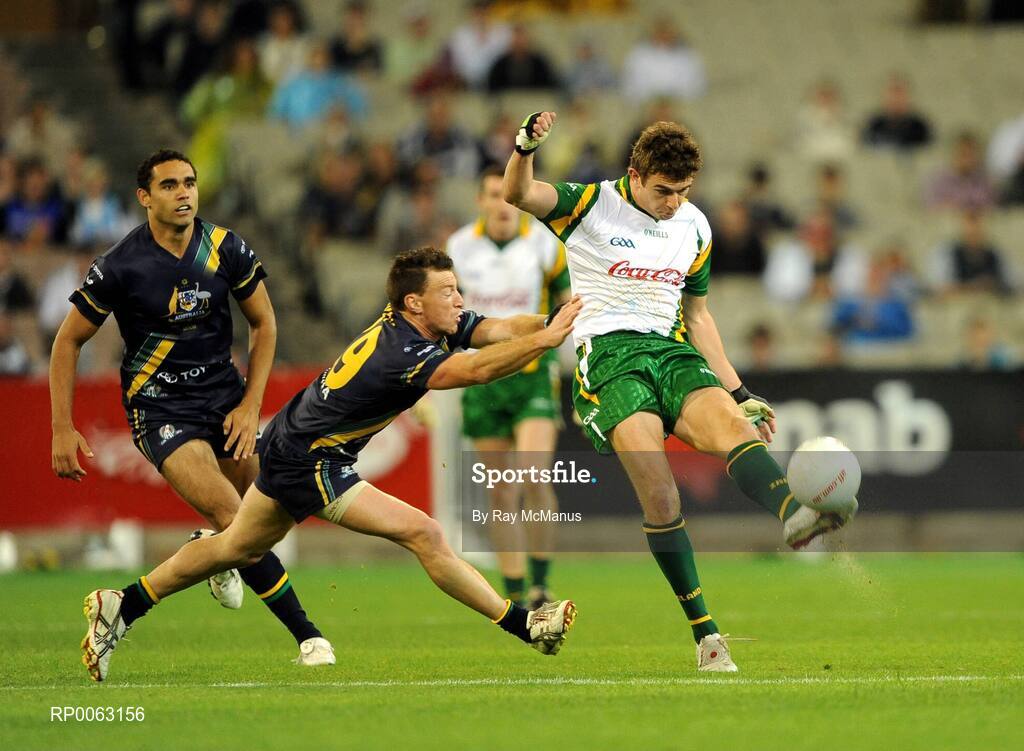 31 October 2008; The Australian captain Brent Harvey tries to block Colm Begley, Ireland. Toyota International Rules Series, Australia v Ireland, Melbourne Cricket Ground, Melbourne, Australia. Picture credit: Ray McManus / SPORTSFILE