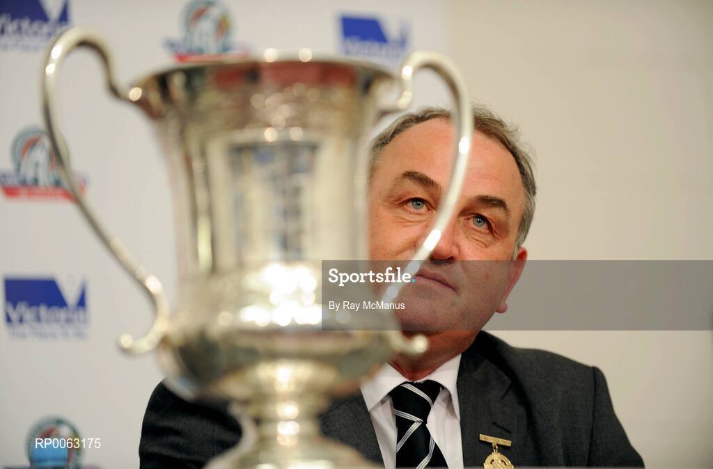 31 October 2008; The Cormack McAnallen cup sits on a table as GAA Pressident Nickey Brennan listens to questions at the after match press conference. Toyota International Rules Series, Australia v Ireland, Melbourne Cricket Ground, Melbourne, Australia. Picture credit: Ray McManus / SPORTSFILE