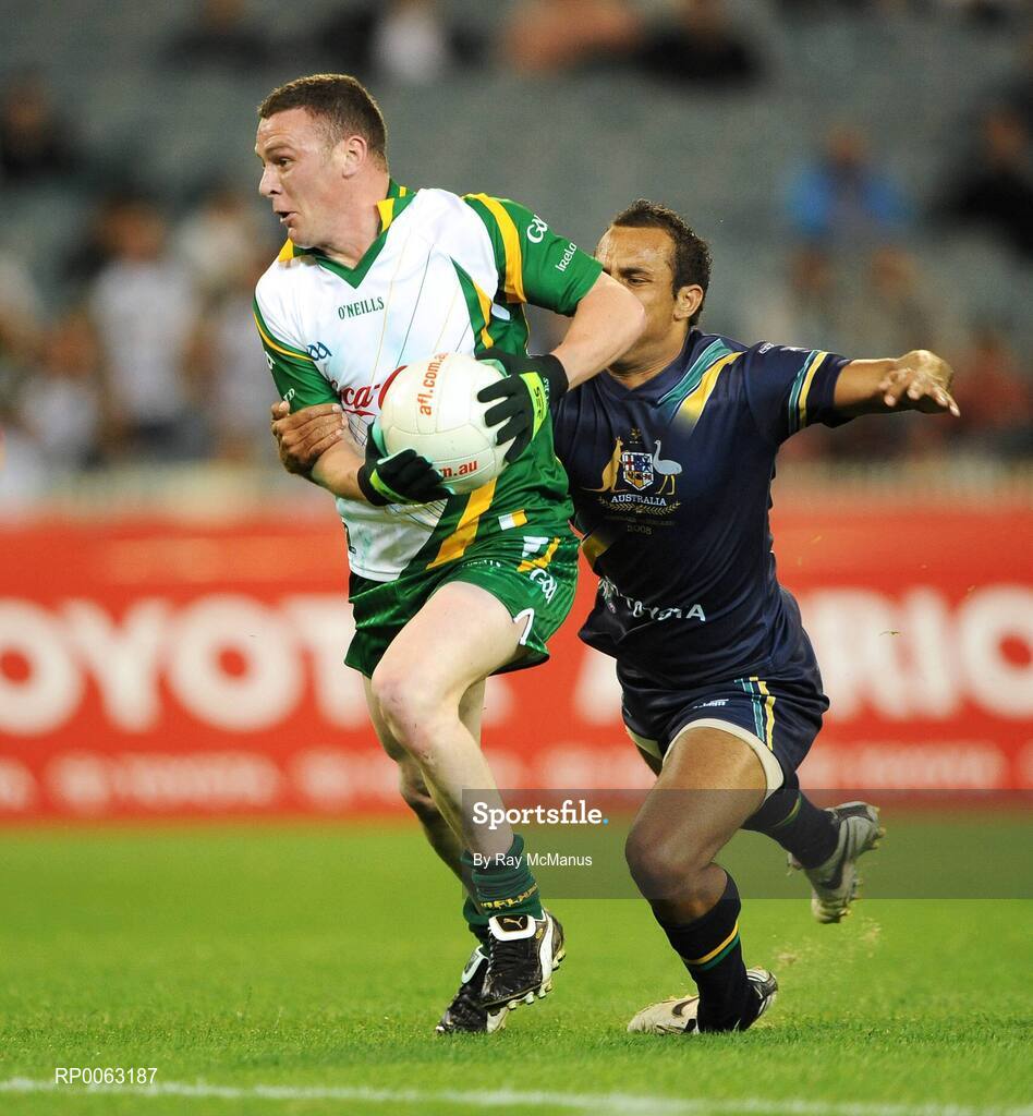 31 October 2008; Leighton Glynn, Ireland, is tackled by Roger Hayden, Australia. Toyota International Rules Series, Australia v Ireland, Melbourne Cricket Ground, Melbourne, Australia. Picture credit: Ray McManus / SPORTSFILE
