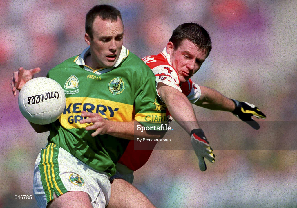 2 September 2000; John Crowley of Kerry is tackled by Justin McNulty of Armagh during the Bank of Ireland All-Ireland Senior Football Championship Semi-Final Replay match between Kerry and Armagh at Croke Park in Dublin. Photo by Brendan Moran/Sportsfile