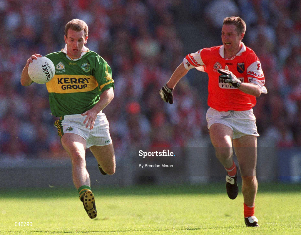 2 September 2000; Mike Hassett of Kerry in action against Andrew McCann of Armagh during the Bank of Ireland All-Ireland Senior Football Championship Semi-Final Replay match between Kerry and Armagh at Croke Park in Dublin. Photo by Brendan Moran/Sportsfile