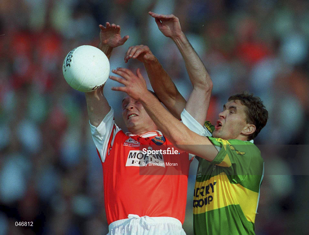 2 September 2000; Gerard Reid of Armagh in action against Maurice Fitzgerald of Kerry during the Bank of Ireland All-Ireland Senior Football Championship Semi-Final Replay match between Kerry and Armagh at Croke Park in Dublin. Photo by Brendan Moran/Sportsfile