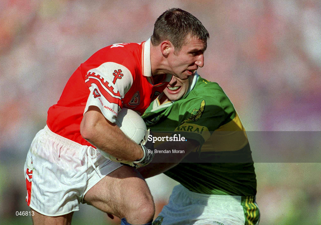 2 September 2000; Enda McNulty of Armagh goes past John Crowley of Kerryduring the Bank of Ireland All-Ireland Senior Football Championship Semi-Final Replay match between Kerry and Armagh at Croke Park in Dublin. Photo by Brendan Moran/Sportsfile