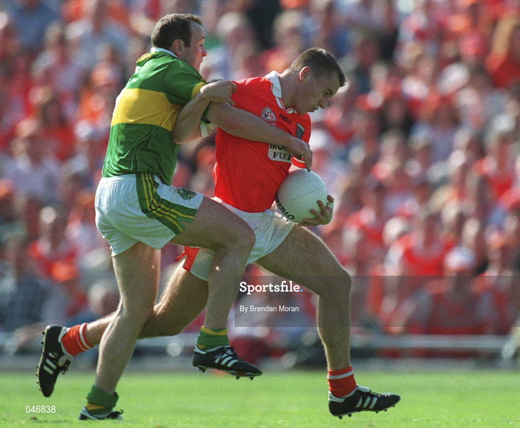2 September 2000; Paddy McKeever of Armagh is tackled by Seamus Moynihan of Kerry during the Bank of Ireland All-Ireland Senior Football Championship Semi-Final Replay match between Kerry and Armagh at Croke Park in Dublin. Photo by Brendan Moran/Sportsfile