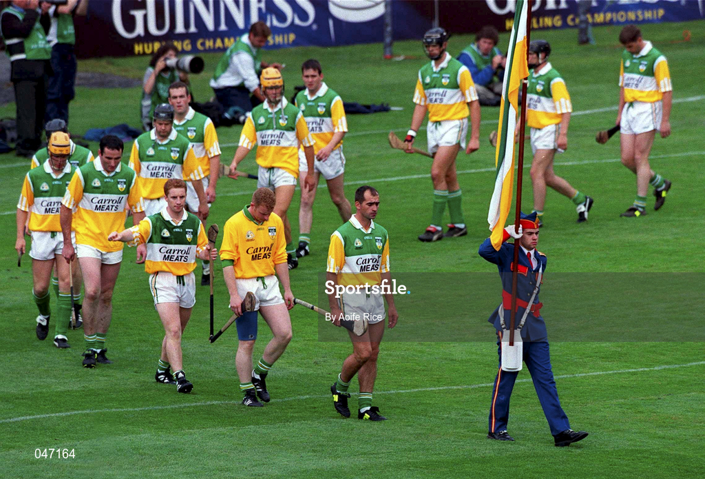10 September 2000; The Offaly team led by Captain Johnny Dooley in the parade ahead of the All-Ireland Senior Hurling Championship Final match between Kilkenny and Offaly at Croke Park in Dublin. Photo by Aoife Rice/Sportsfile