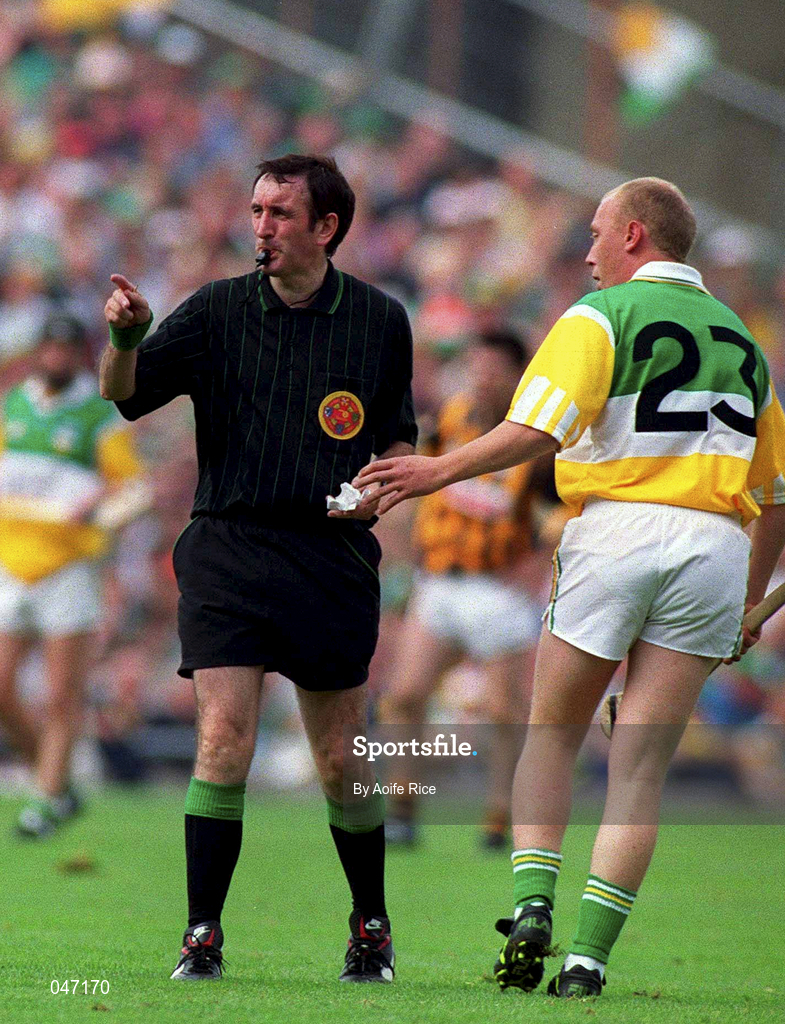 10 September 2000; John Troy of Offaly hands referee Willie Barrett the substitution slip during the All-Ireland Senior Hurling Championship Final match between Kilkenny and Offaly at Croke Park in Dublin. Photo by Aoife Rice/Sportsfile